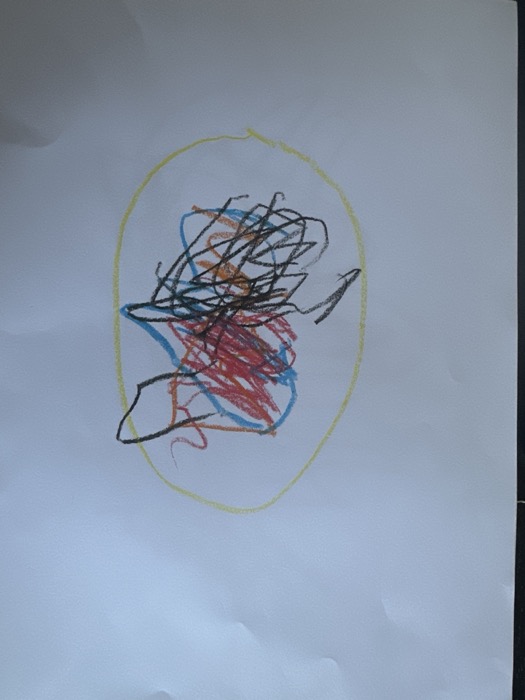 Bruno's original crayon drawing of the logo on paper